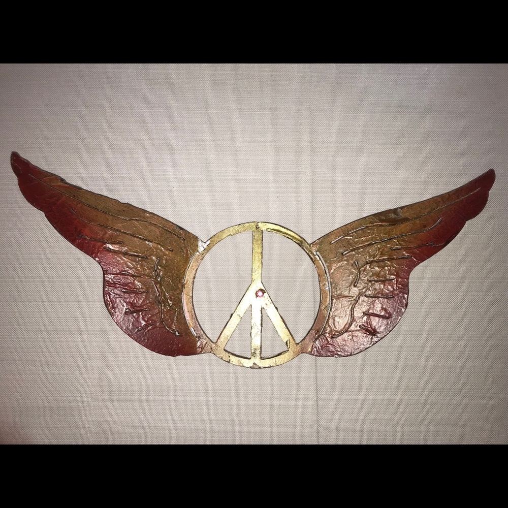 Wrought iron angel wings art